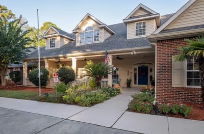 Exterior view of Village Cove Assisted Living facility