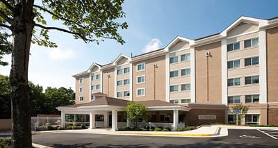 Exterior view of Tall Oaks Assisted Living facility