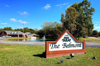 Exterior view of Belmont Assisted Living facility with signage