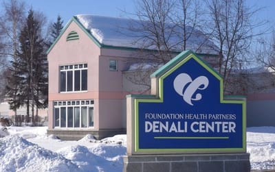 Exterior view of the Denali Center building and logo