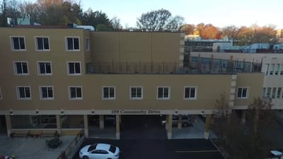 Exterior view of Highfield Gardens Care Center building