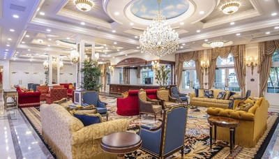 Interior view of a luxurious common area with seating