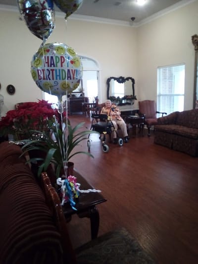 Resident celebrating a birthday in a common area