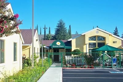Exterior view of Sunny Place with landscaping