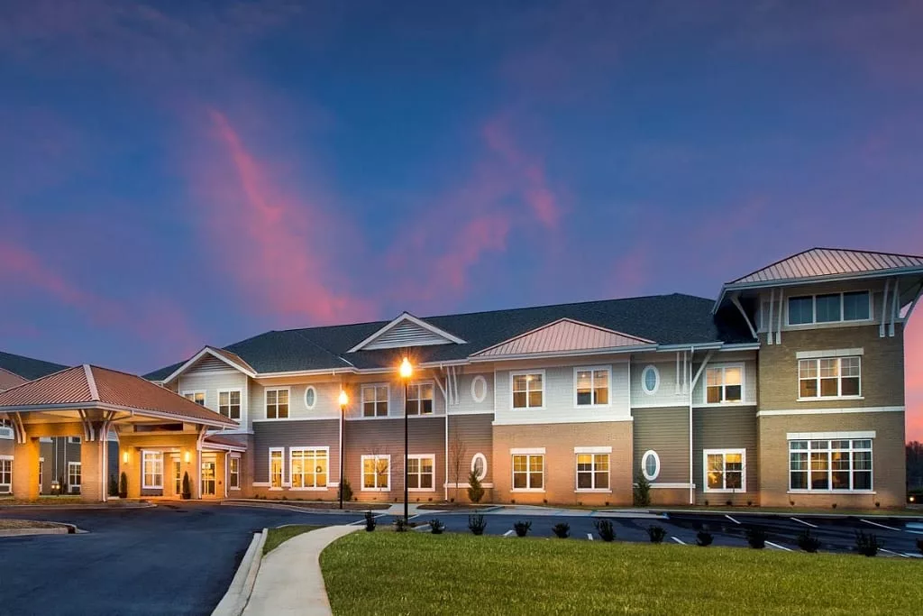 Exterior view of The Residences at Greer at dusk