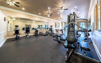Interior view of a fitness area with workout equipment