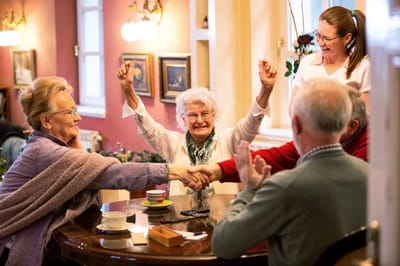 Residents celebrating and engaging in an activity together