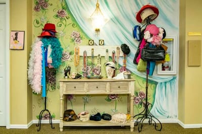 Decorative display of hats and accessories in a common area