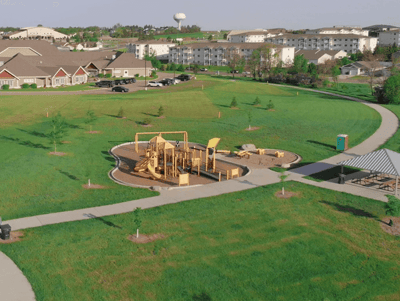 Aerial view of a playground in a grassy area