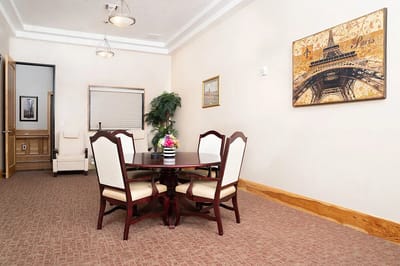 Well-furnished lounge area in a senior living facility