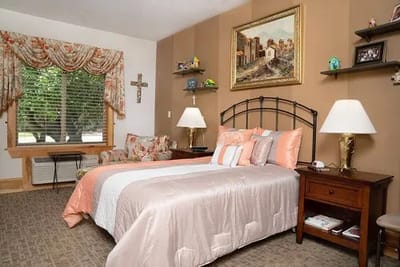 Cozy resident room with bed and seating area