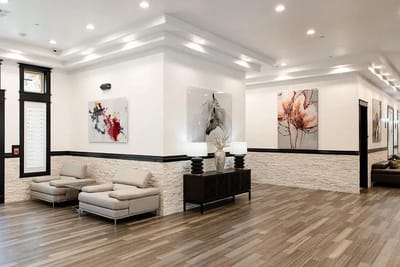 Bright lobby area with modern furnishings and artwork