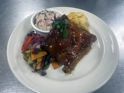 Plate of delicious meatloaf with sides