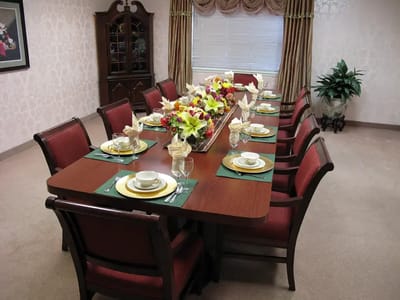 Elegant dining room setup with floral centerpiece