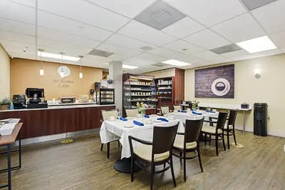 Dining area with tables set for meals
