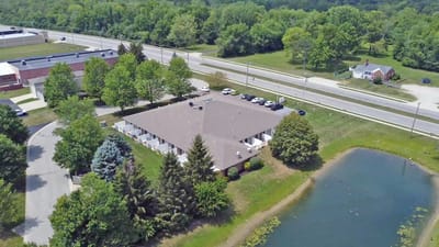 Aerial view of Heritage Assisted Living Yorktown with pond