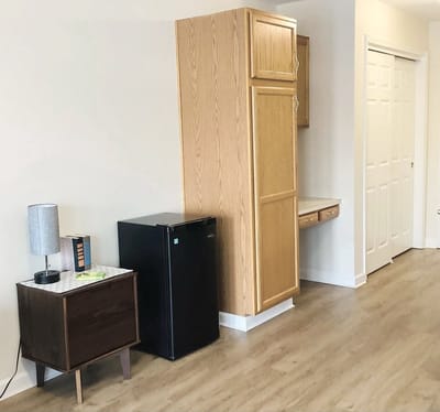 Interior view of a resident's room with furniture