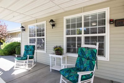 Cozy outdoor seating area with rocking chairs