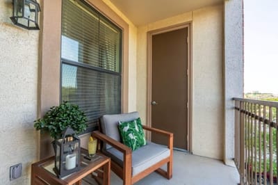 Outdoor balcony with seating and plants