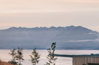 Scenic outdoor view of mountains and water
