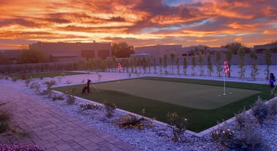 Outdoor putting green at sunset