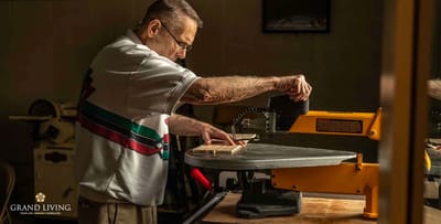 A resident working on a woodworking project in a workshop