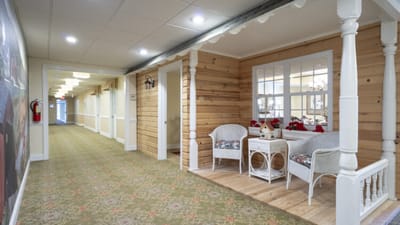 Hallway with seating area and decorative elements