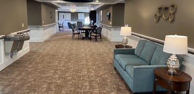 Interior view of a common area with seating and tables