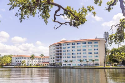Exterior view of Westminster Towers building by the water
