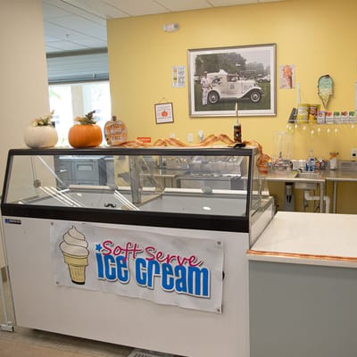 Ice cream serving counter with soft serve sign