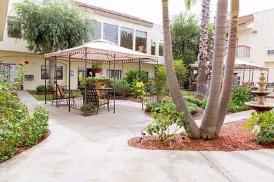 Well-maintained outdoor space with seating and landscaping