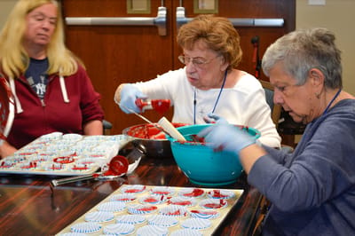 Residents baking in an activity room