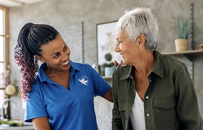 Caregiver interacting with a senior resident
