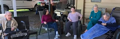 Residents interacting in an outdoor space