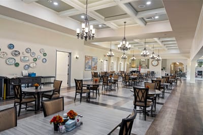 Interior dining area with tables and decor.