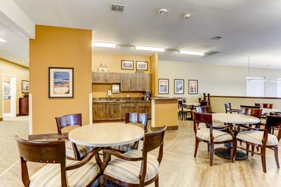 Cozy dining area with tables and chairs