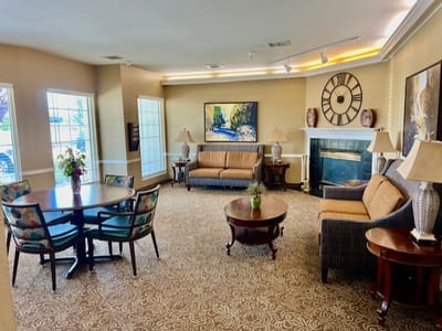 Cozy common area with seating and artwork.