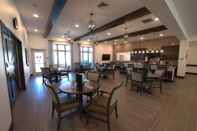 Dining room area with tables and chairs