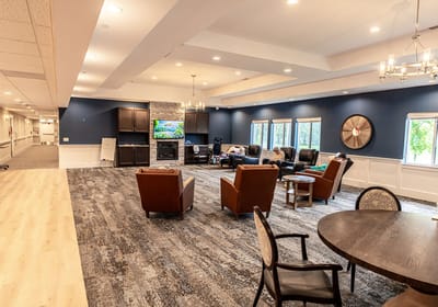 Cozy common area with seating and TV
