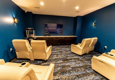 Cozy movie room with reclining seats