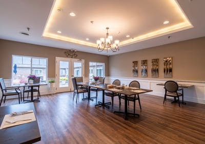 Bright dining area with tables and chairs
