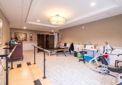 Interior therapy room with equipment and seating
