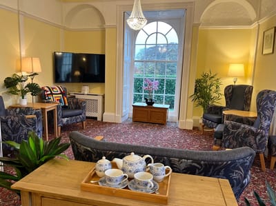A cozy common area with comfortable seating and natural light