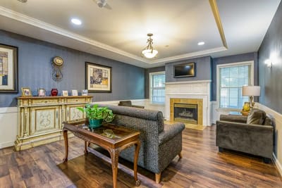 Cozy common area with seating and fireplace