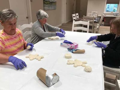 Residents participating in a crafting activity