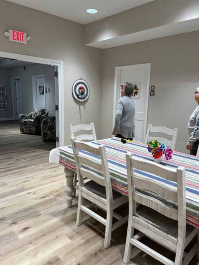 Residents interacting in a well-lit common area