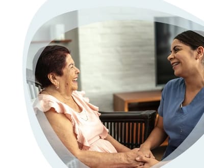 Gentiva Hospice – Tucson, home care in Tucson, AZ — Smiling caregiver and senior sharing a moment together
