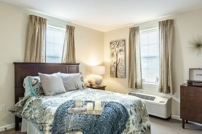 Cozy private bedroom with natural light