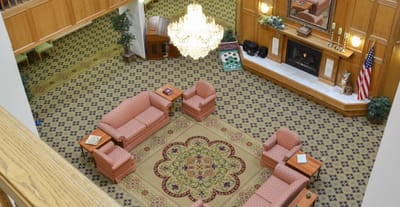Interior common area with seating and fireplace