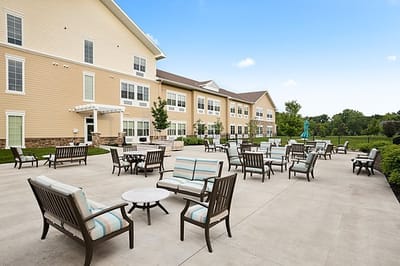 Outdoor seating area with chairs and tables